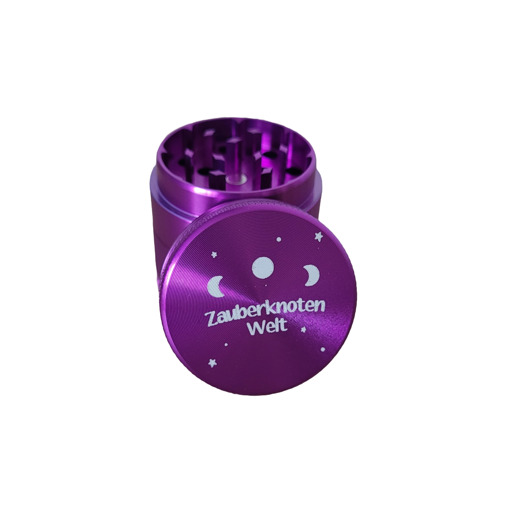 Lila Grinder mit dem Schriftzug Zauberknoten Welt auf dem Deckel graviert